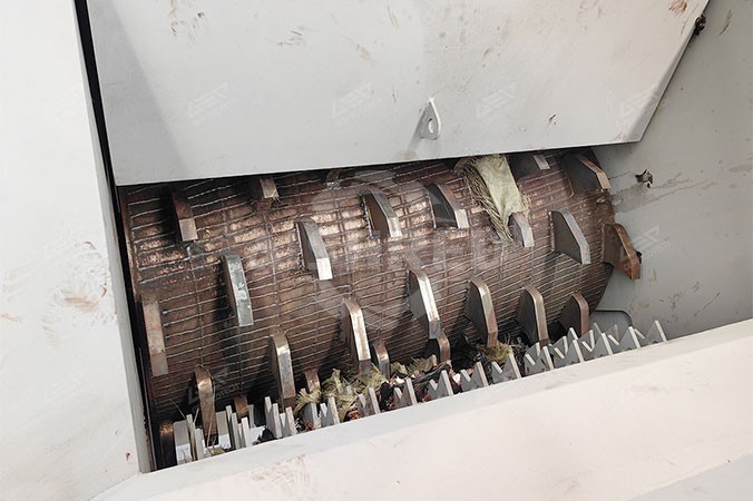 Abridor de Sacos de Resíduos